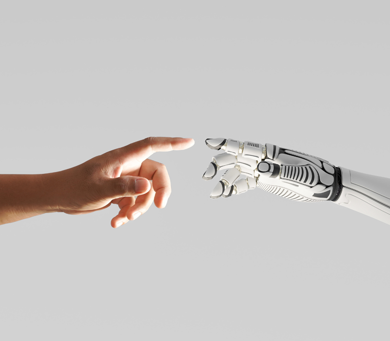 Human hand with robot hand - MLP - GLASS & BOW LTD Covered